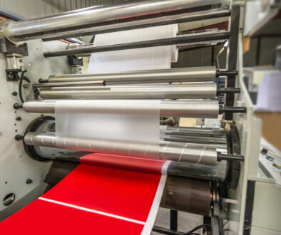 Matte or gloss plastic machine in a printing press for a perfect finish of printed documents.